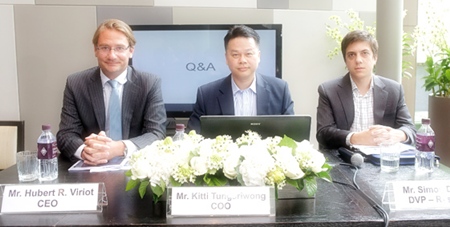 (From left-right): Raimon Land Chief Executive Officer Hubert Viriot, Chief Operations Officer Kitti Tungsriwong and Deputy VP of Research and Development, Simon Derville talk at a press conference to discuss the company’s new projects and latest sales performance and financial results.